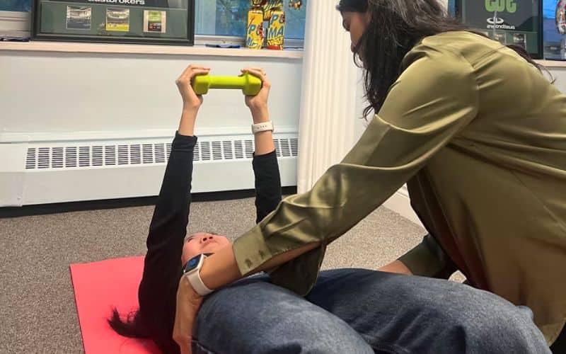 physiotherapist & patient core exercises
